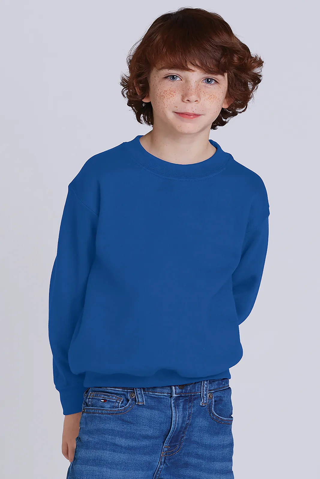 Gildan Youth Heavy Blend Crewneck Sweatshirt — Style 18000B in Royal — manufacturer lifestyle photo