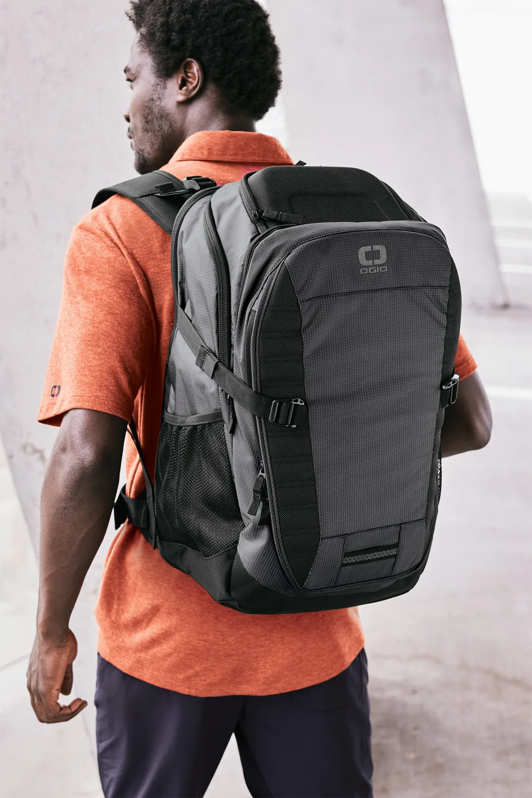 Custom OGIO Motion X-Over Pack — lifestyle photo