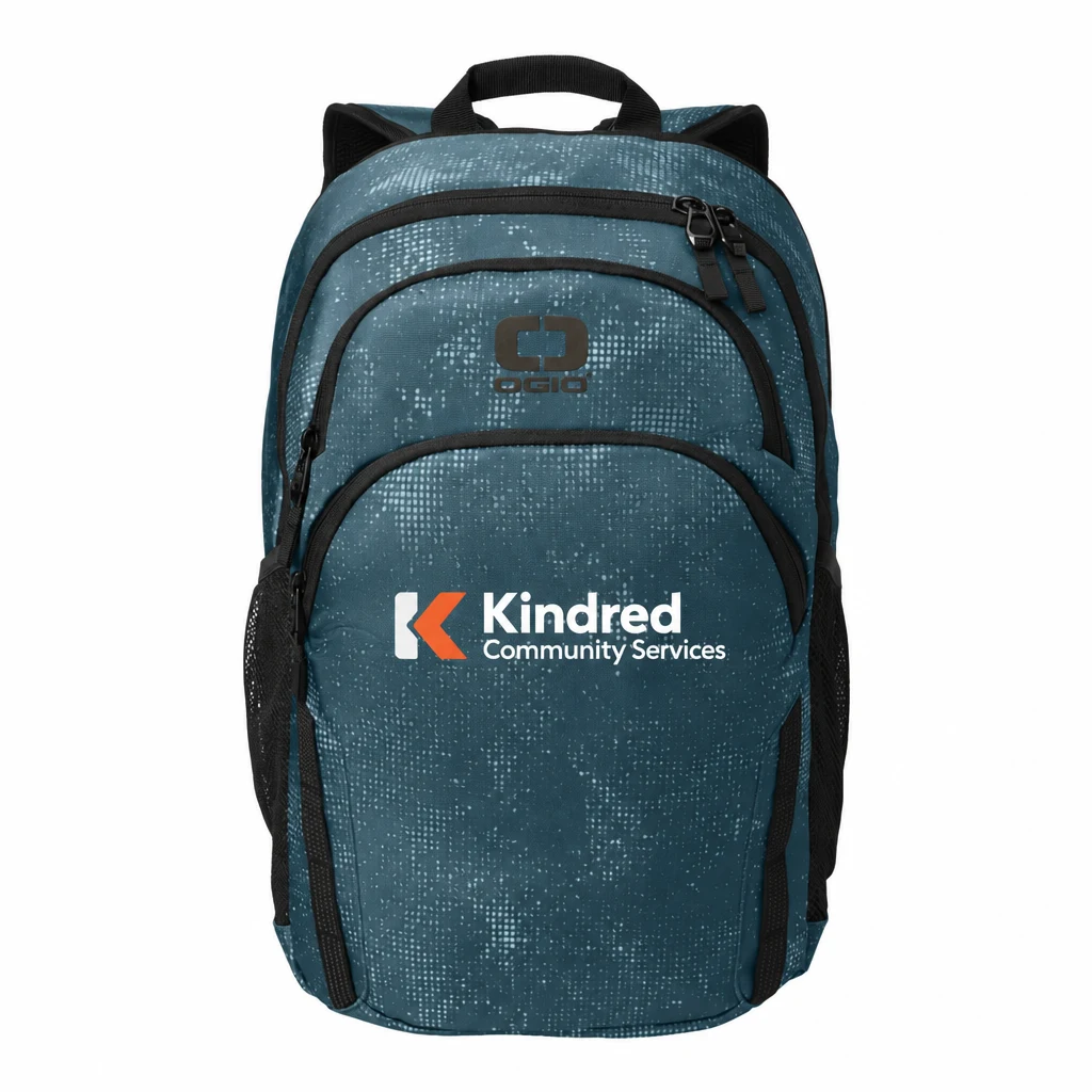 Custom OGIO Forge Pack (91021) in Blue Haze, flat-lay view with a custom printed logo. Example design