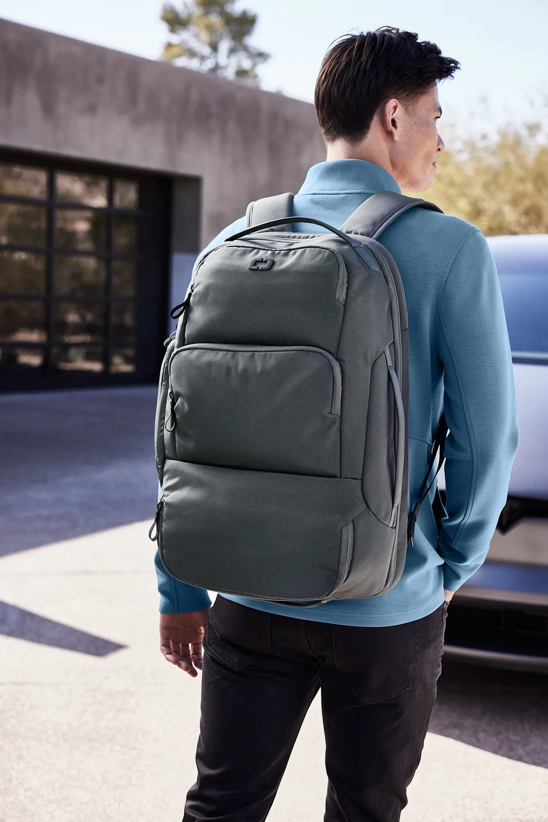 Custom OGIO Ultimate Travel Pack — lifestyle photo