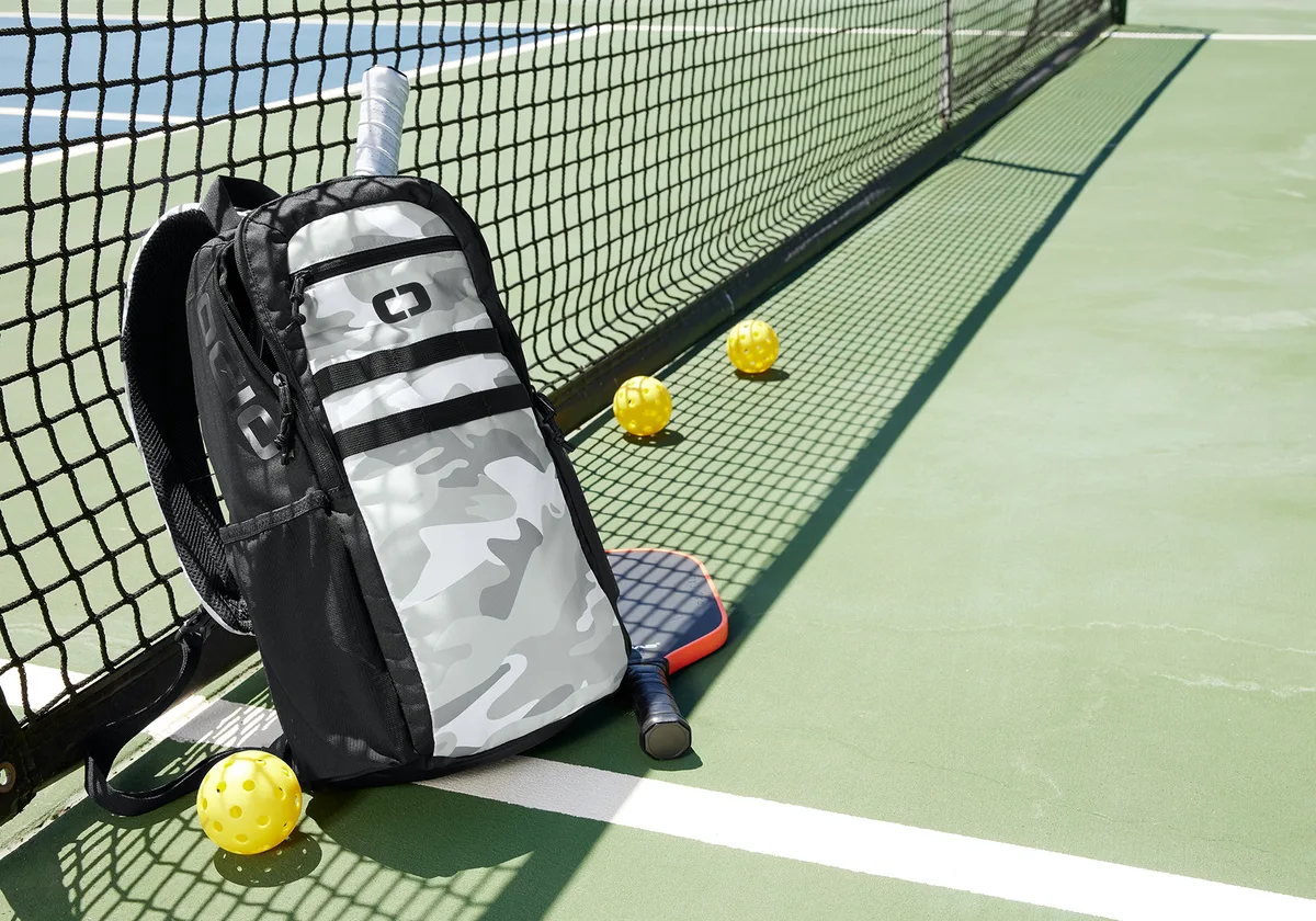 OGIO Court Sling — lifestyle photo, shown in Arctic Camo