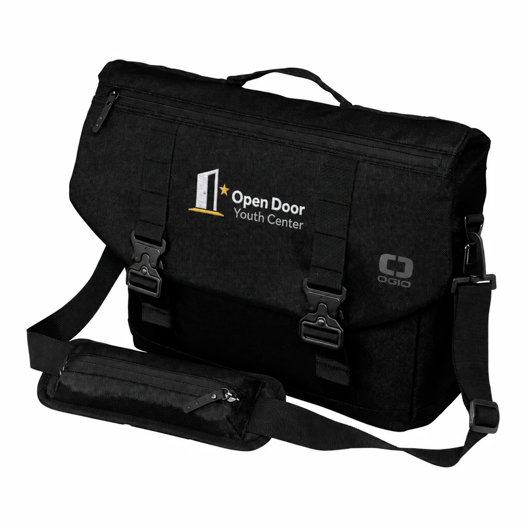 Custom OGIO Command Messenger (93000) in Blacktop, flat-lay view with a custom embroidered logo.