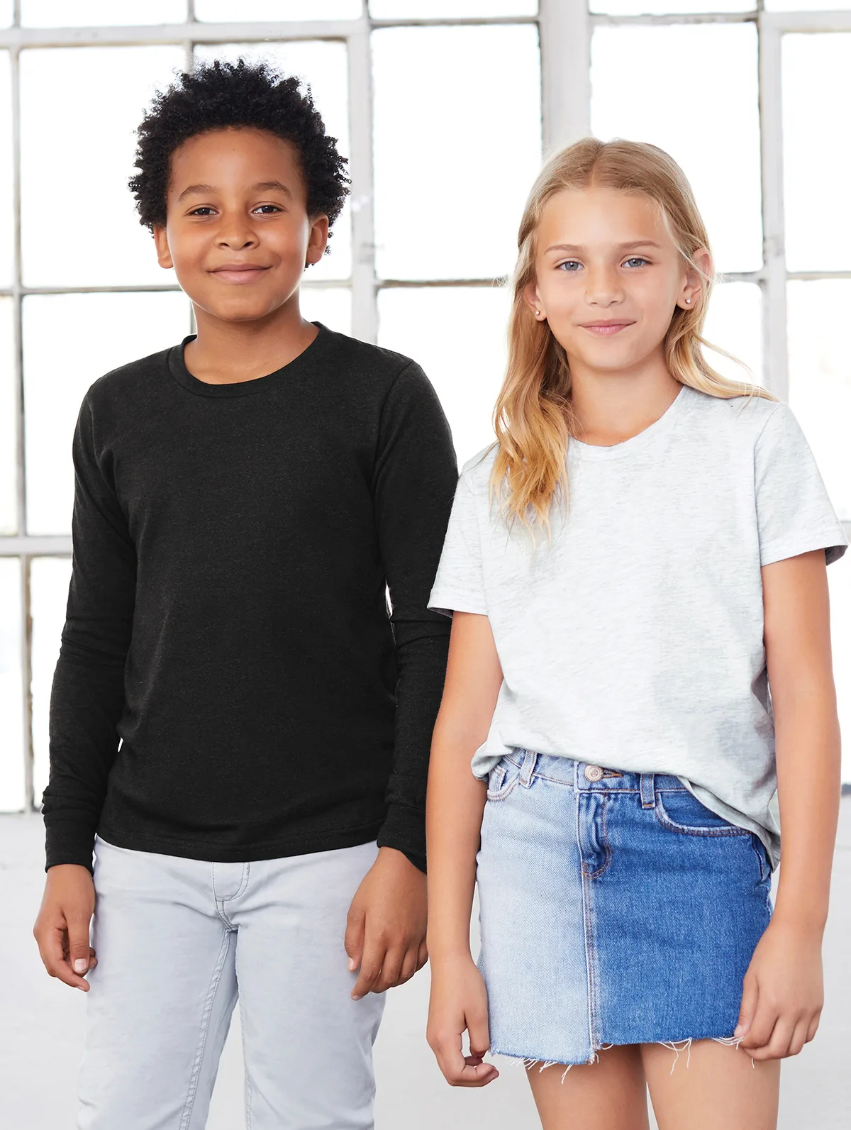 BELLA+CANVAS Youth Jersey Short Sleeve Tee — Style BC3001Y in Black — manufacturer lifestyle photo