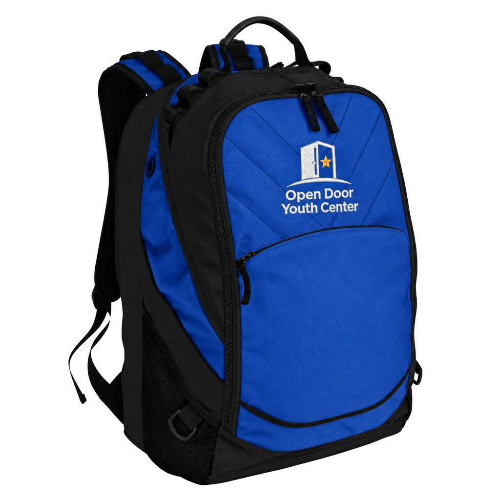 Custom Port Authority Xcape Computer Backpack (BG100) in Shock Blue/ Black, flat-lay view with a custom embroidered logo. Example design