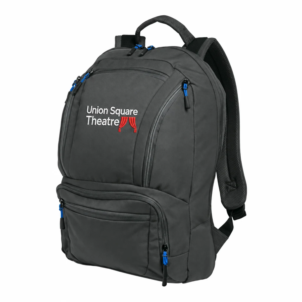 Custom Port Authority Cyber Backpack (BG200) in Dark Charcoal/ Royal, flat-lay view with a custom embroidered logo. Example design