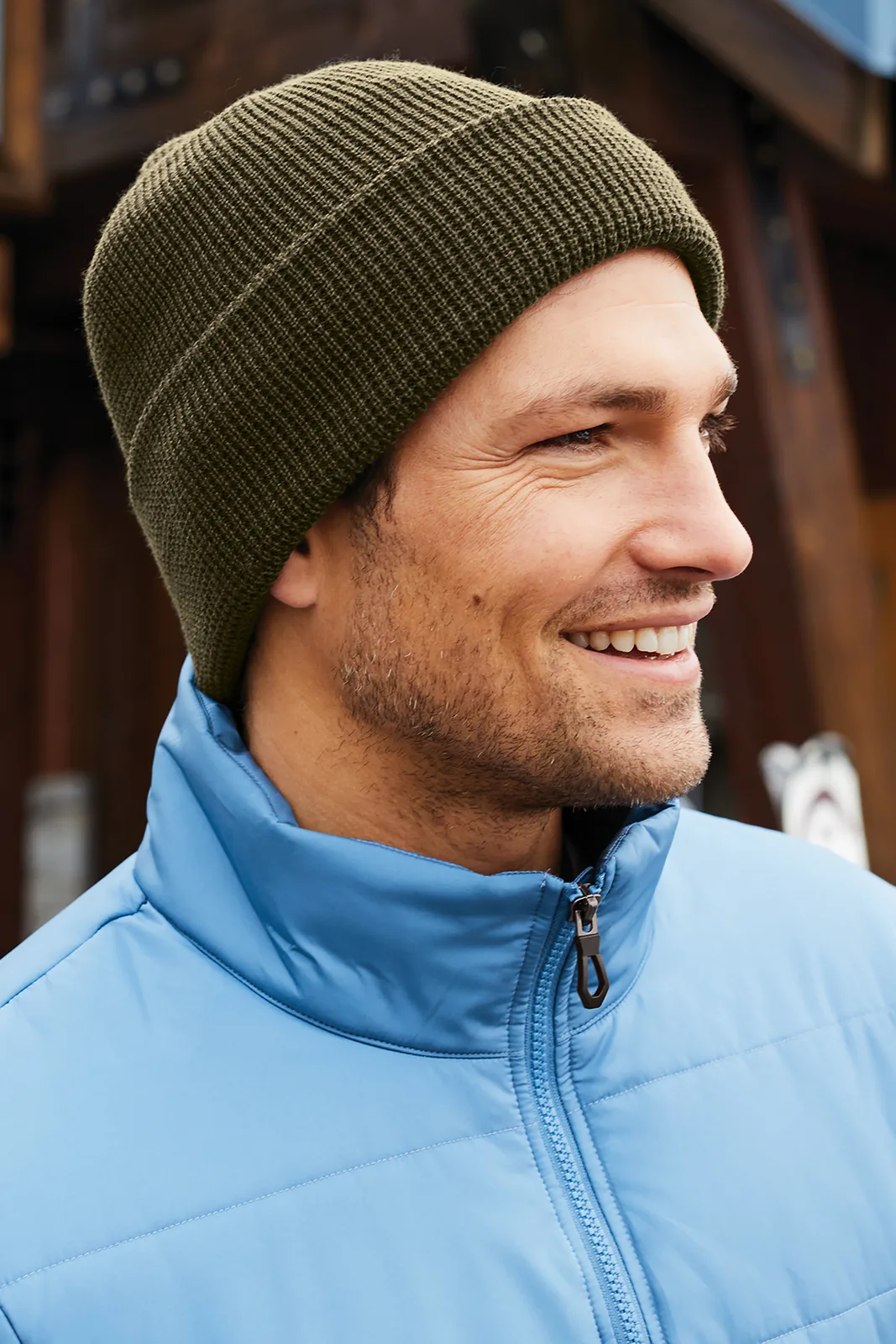 Port Authority Thermal Knit Cuffed Beanie — Style C955 in Olive Green — manufacturer lifestyle photo