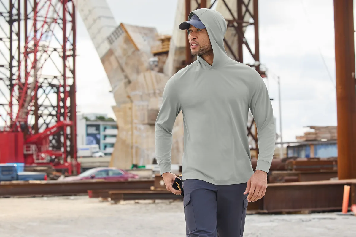 CornerStone Workwear Pro Long Sleeve Hooded Tee — Style CS440LSH in Light Grey — manufacturer lifestyle photo