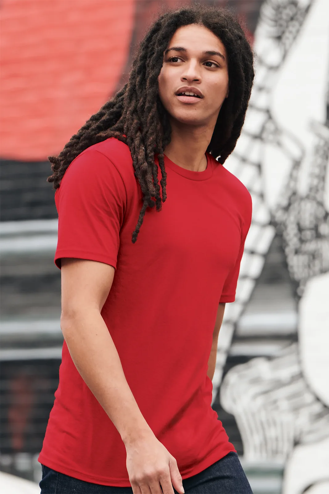 District Perfect Tri Tee — Style DM130 in Classic Red — manufacturer lifestyle photo