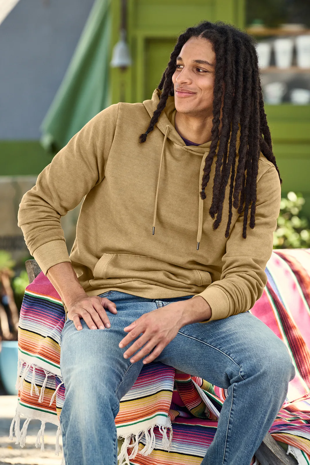 District Wash Fleece Hoodie — Style DT2200 in Golden Spice — manufacturer lifestyle photo
