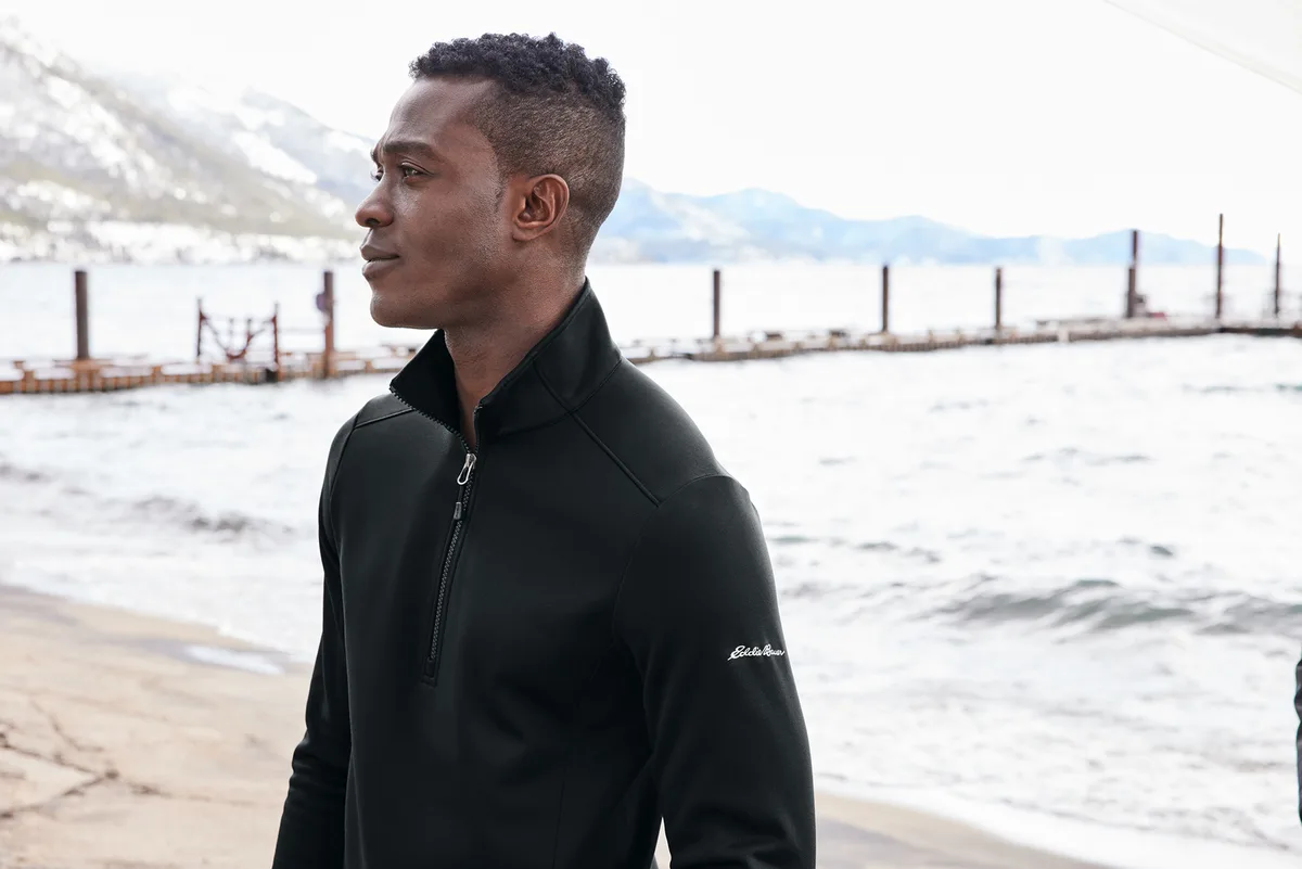 Eddie Bauer Smooth Mid Layer Fleece 1/2-Zip — Style EB2360 in Black — manufacturer lifestyle photo
