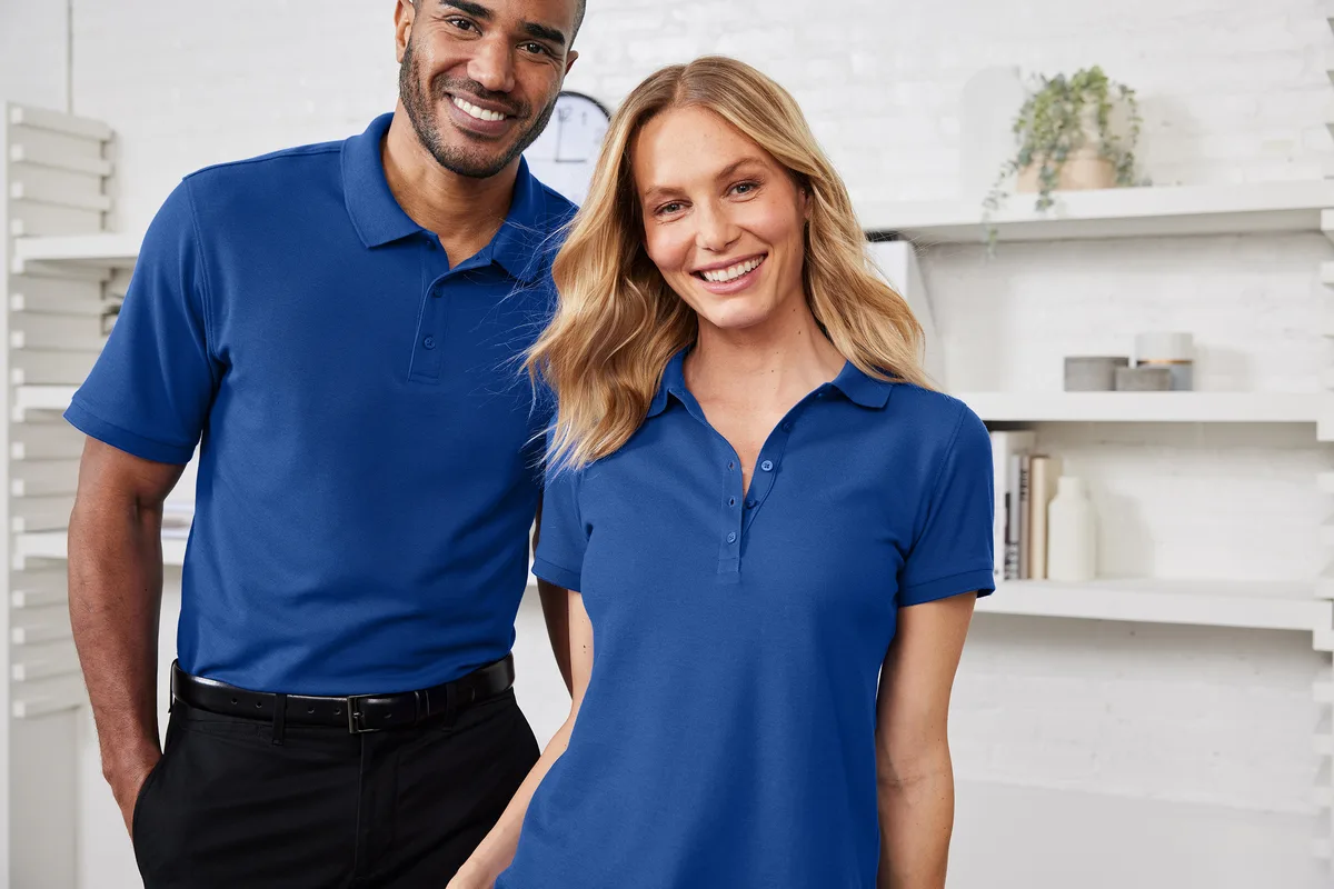 Port Authority Wearever Signature Pique Polo — Style K200 in True Royal — manufacturer lifestyle photo