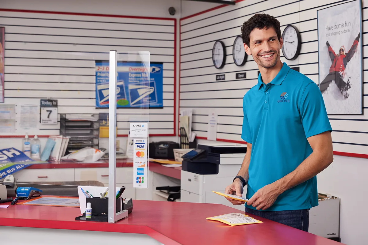 Port Authority Wearever Performance Pique Polo — Style K240 in Parcel Blue — manufacturer lifestyle photo