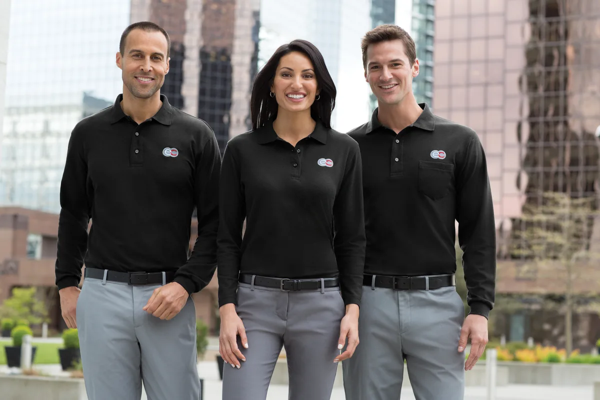 Port Authority Long Sleeve Silk Touch Polo with Pocket — Style K500LSP in Black — manufacturer lifestyle photo