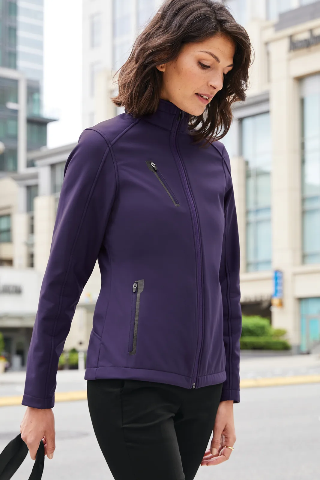 Port Authority Women's Welded Soft Shell Jacket — Style L324 in Posh Purple — manufacturer lifestyle photo