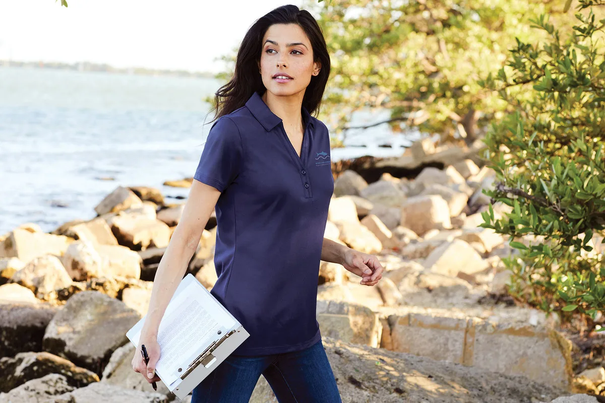 Port Authority Women's C-FREE Performance Polo — Style LK863 in True Navy — manufacturer lifestyle photo