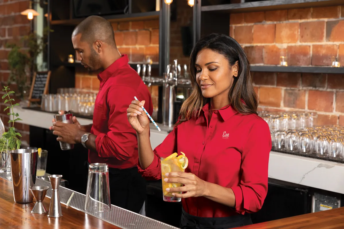 Port Authority Women's Long Sleeve SuperPro React Twill Shirt — Style LW808 in Rich Red — manufacturer lifestyle photo