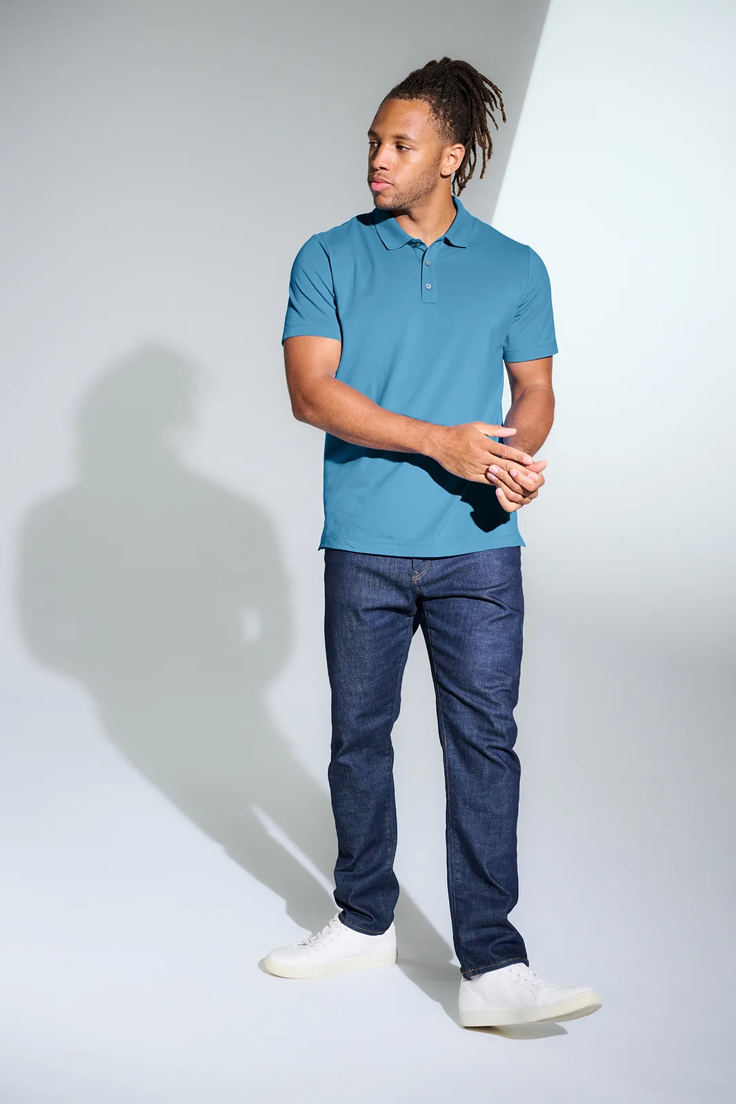 Mercer+Mettle Stretch Pique Polo — Style MM1004 in Parisian Blue — manufacturer lifestyle photo