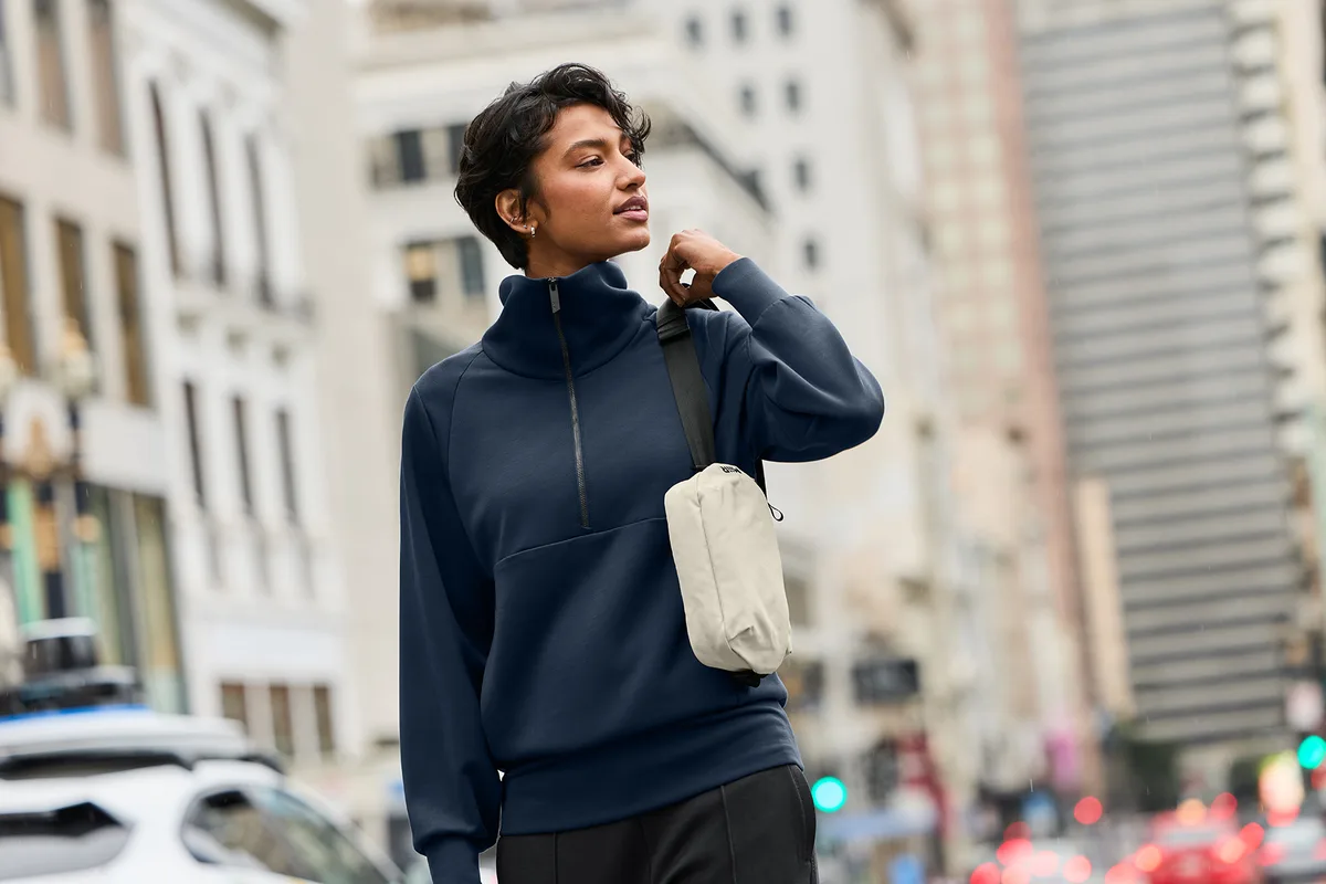 MiiR Causeway Crossbody — lifestyle photo, shown in Alabaster