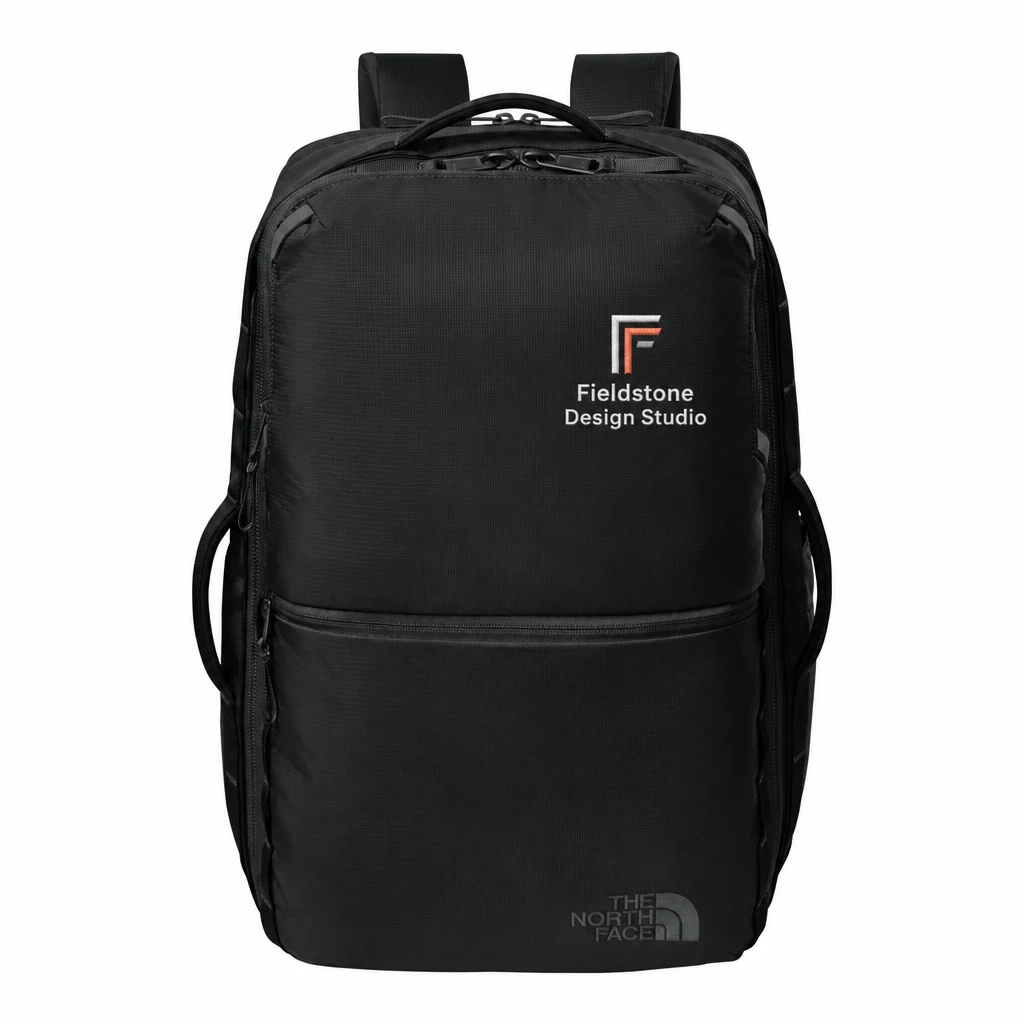 Custom The North Face 35L Travel Backpack (NF0A8EZK) in Shady Blue, flat-lay view with a custom embroidered logo. Example design