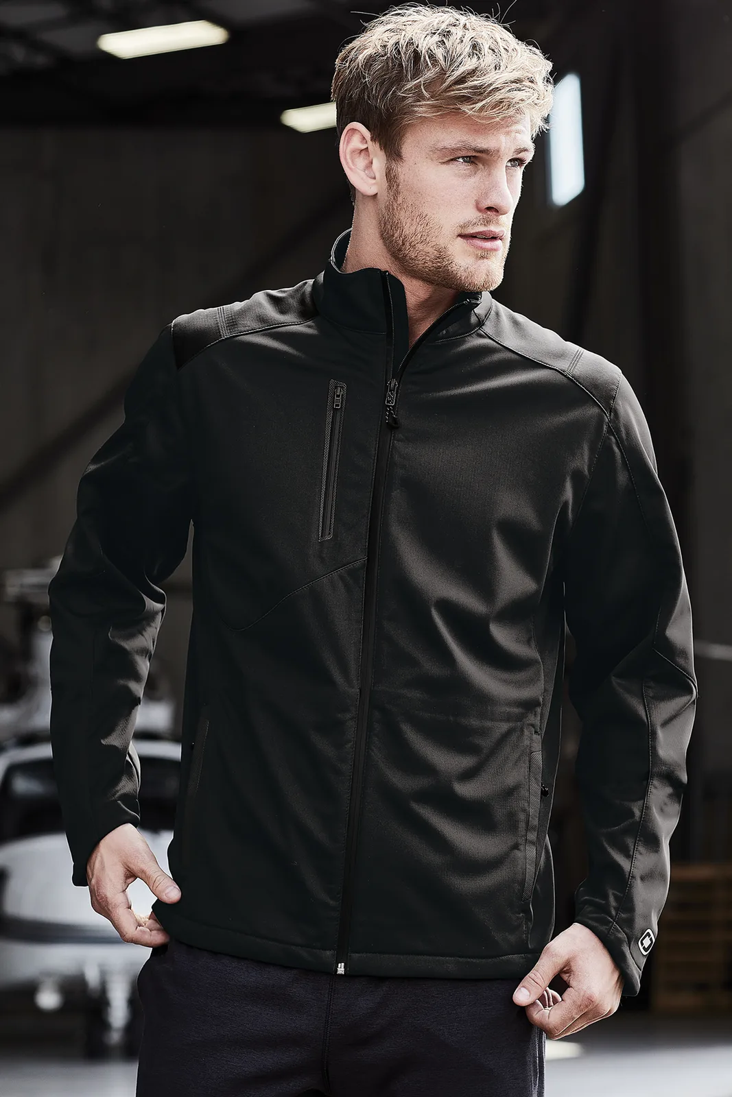 OGIO Crux Soft Shell — Style OE720 in Blacktop — manufacturer lifestyle photo