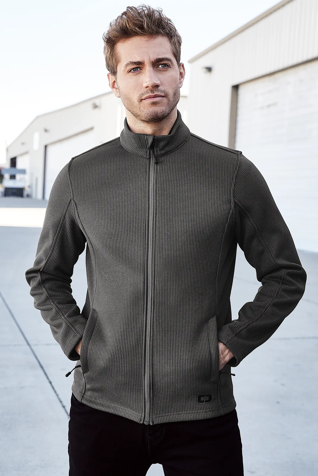 OGIO Grit Fleece Jacket — Style OG727 in Gear Grey — manufacturer lifestyle photo