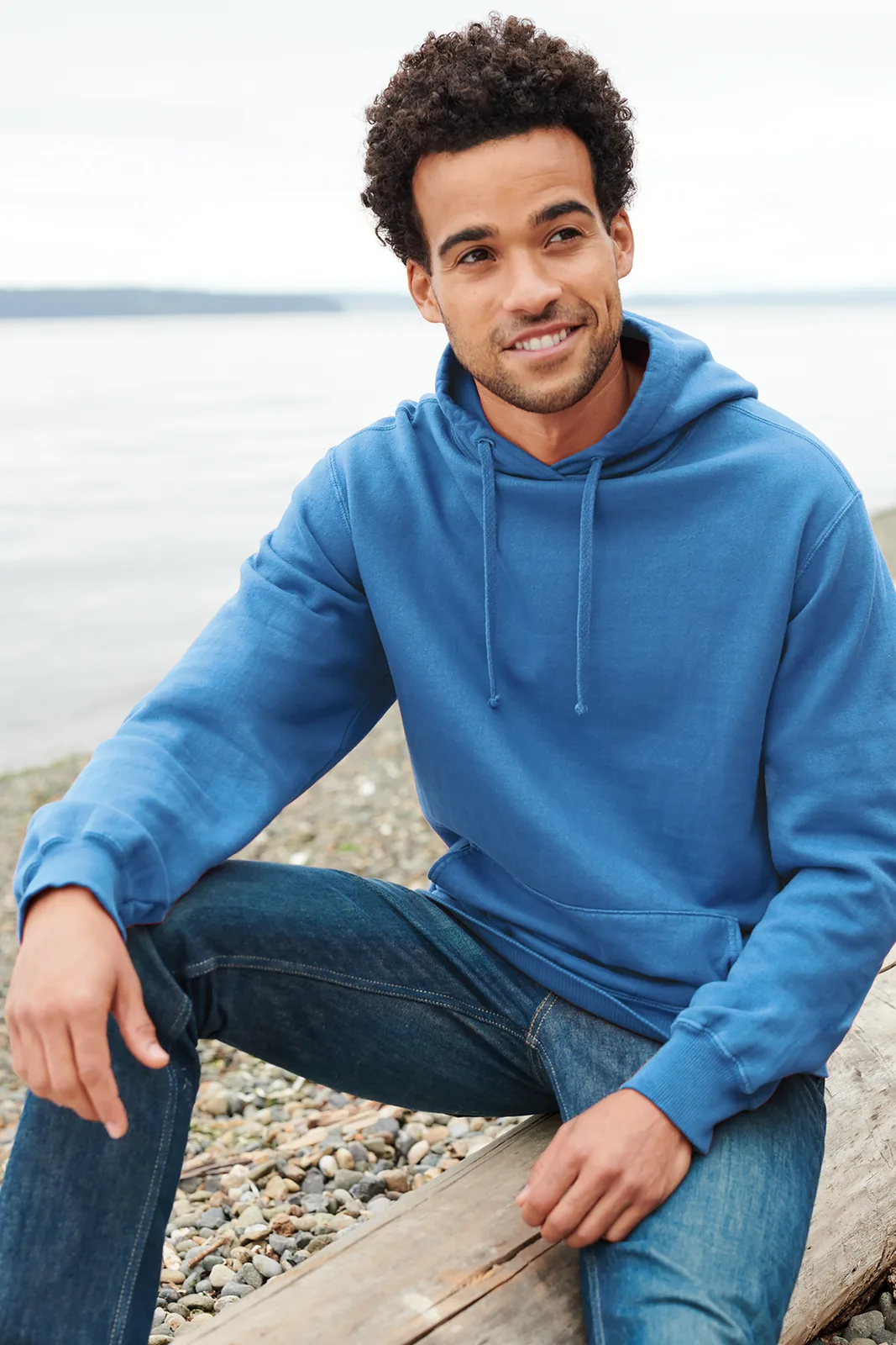 Port & Co Beach Wash Garment-Dyed Pullover Hooded Sweatshirt — Style PC098H in Blue Moon — manufacturer lifestyle photo