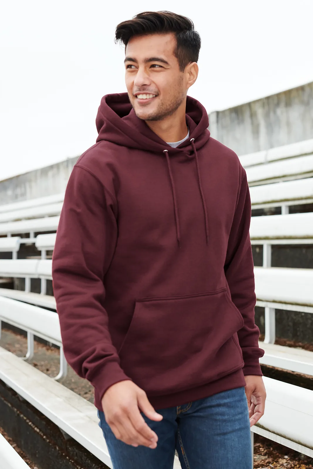 Port & Co Core Fleece Pullover Hooded Sweatshirt — Style PC78H in Maroon — manufacturer lifestyle photo