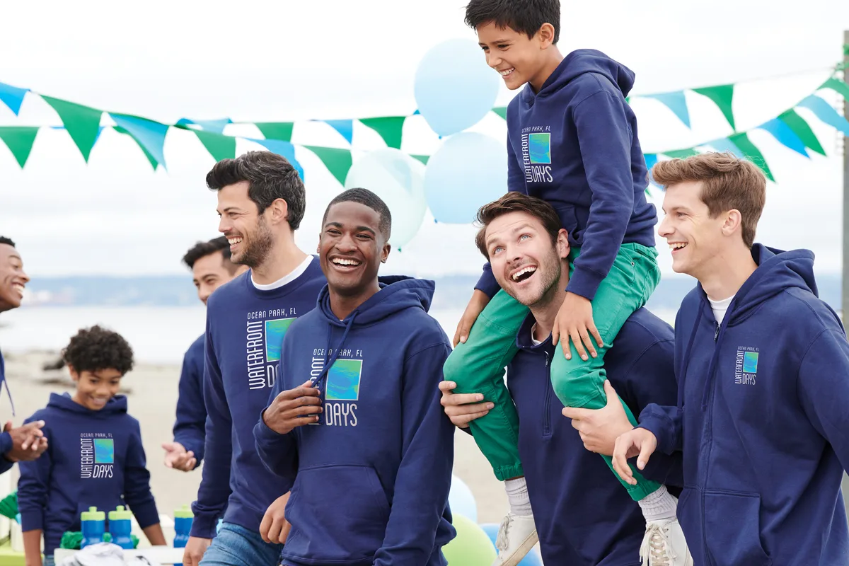 Port & Co Youth Fan Favorite Fleece Pullover Hooded Sweatshirt — Style PC850YH in Team Navy — manufacturer lifestyle photo