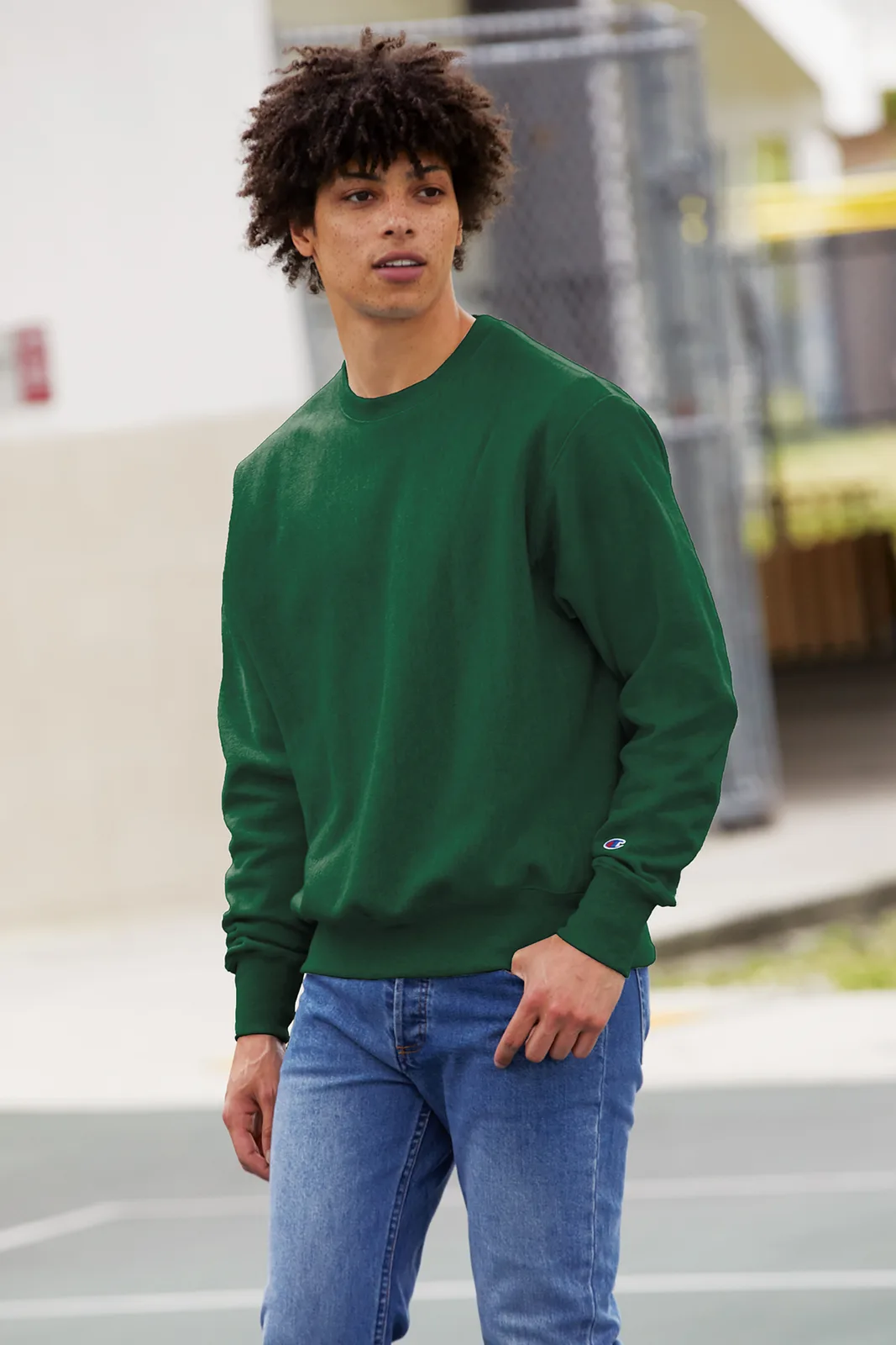 Champion Reverse Weave Crewneck Sweatshirt — Style S149 in Dark Green — manufacturer lifestyle photo
