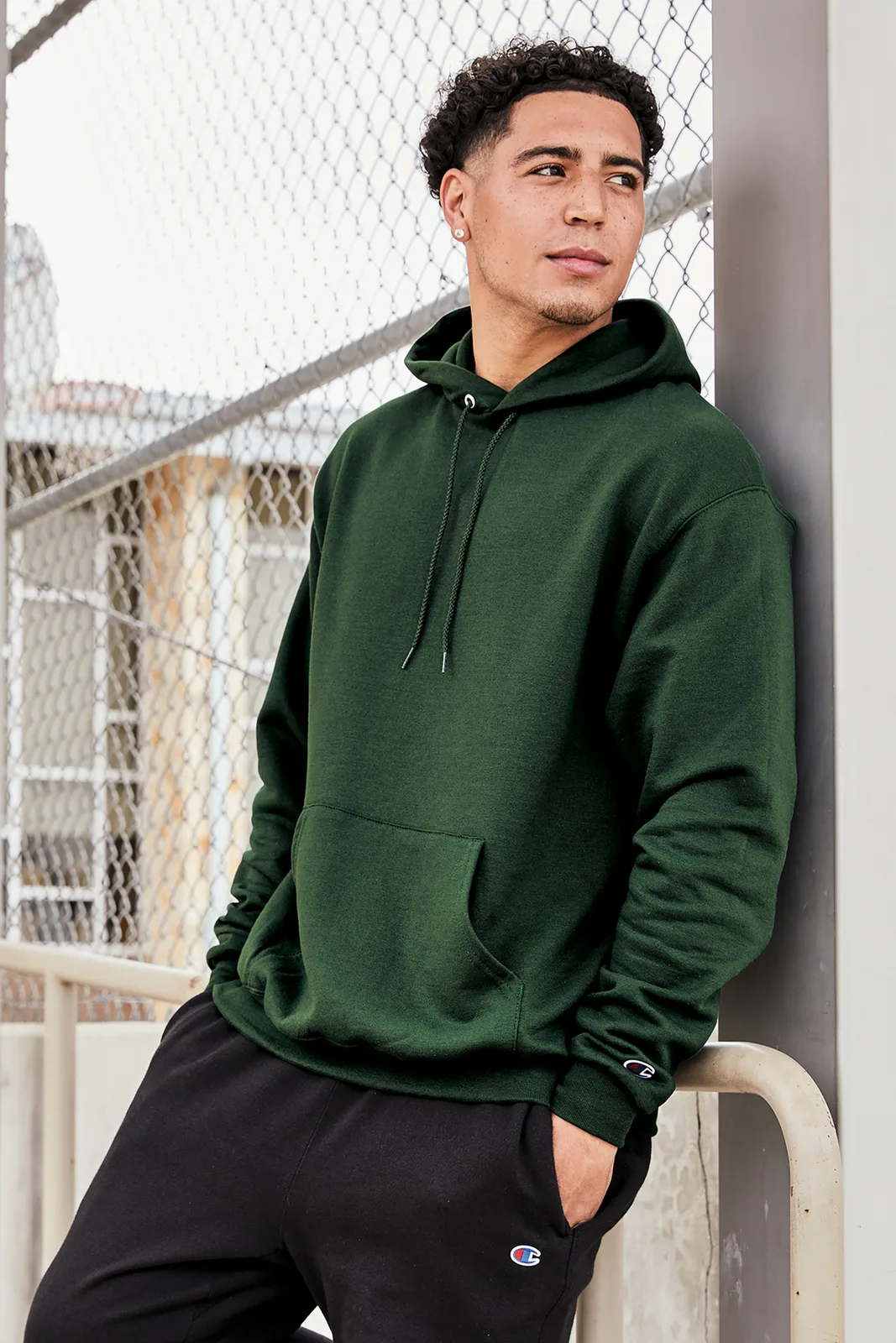 Champion Powerblend Pullover Hoodie — Style S700 in Dark Green — manufacturer lifestyle photo