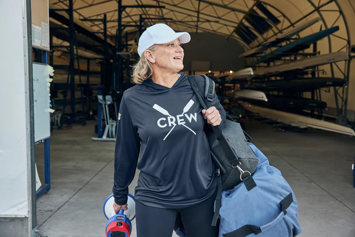Sport-Tek Posi-UV Pro Long Sleeve Hoodie — Style ST420LSH in True Navy — manufacturer lifestyle photo