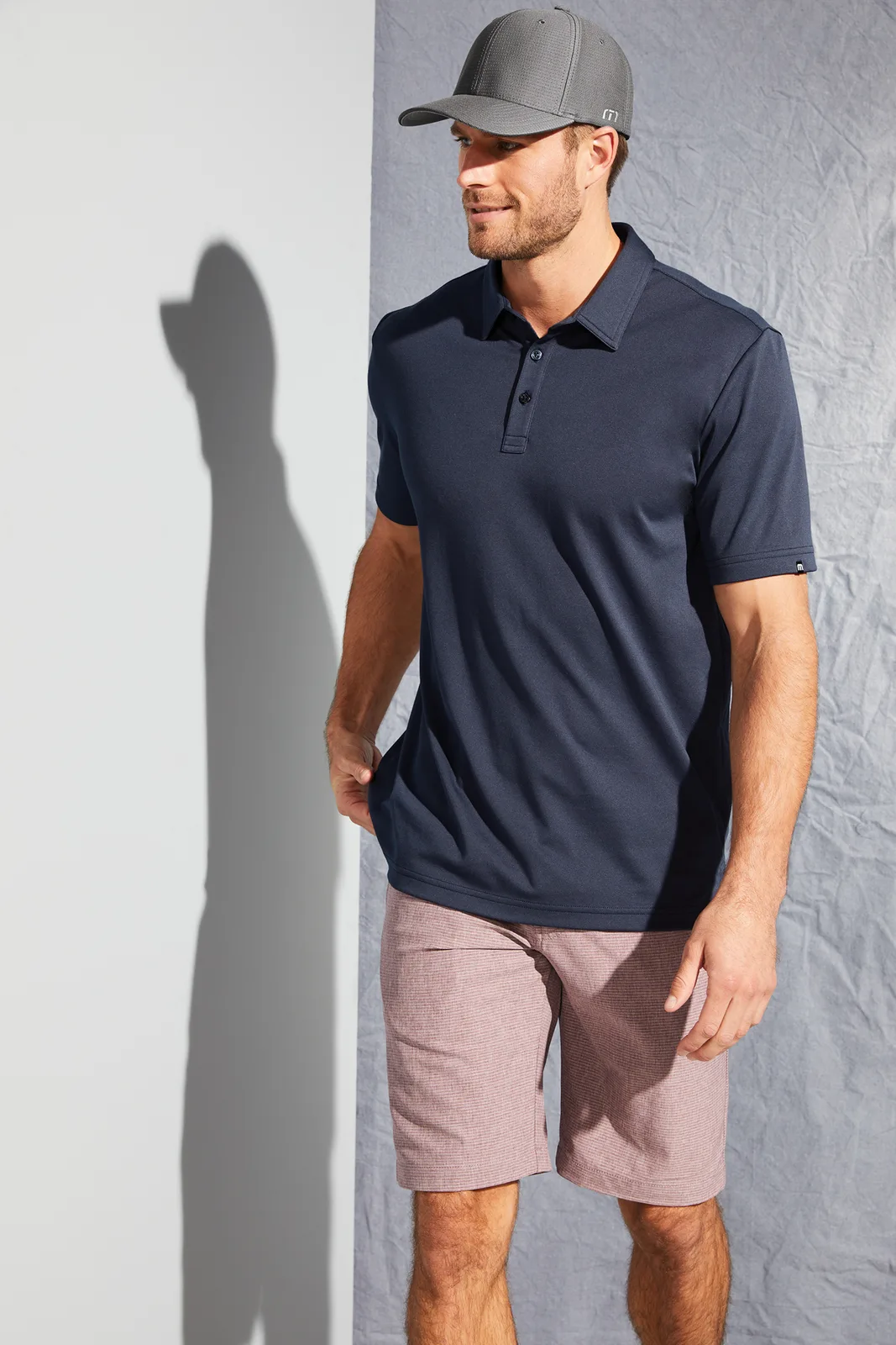 TravisMathew Oceanside Solid Polo — Style TM1MU411 in Blue Nights — manufacturer lifestyle photo