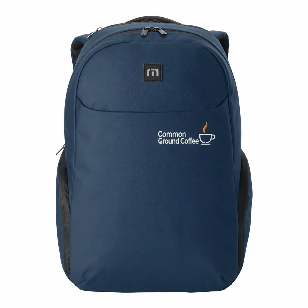 Custom TravisMathew Recess Backpack (TMB109) in River Blue Navy, flat-lay view with a custom embroidered logo.