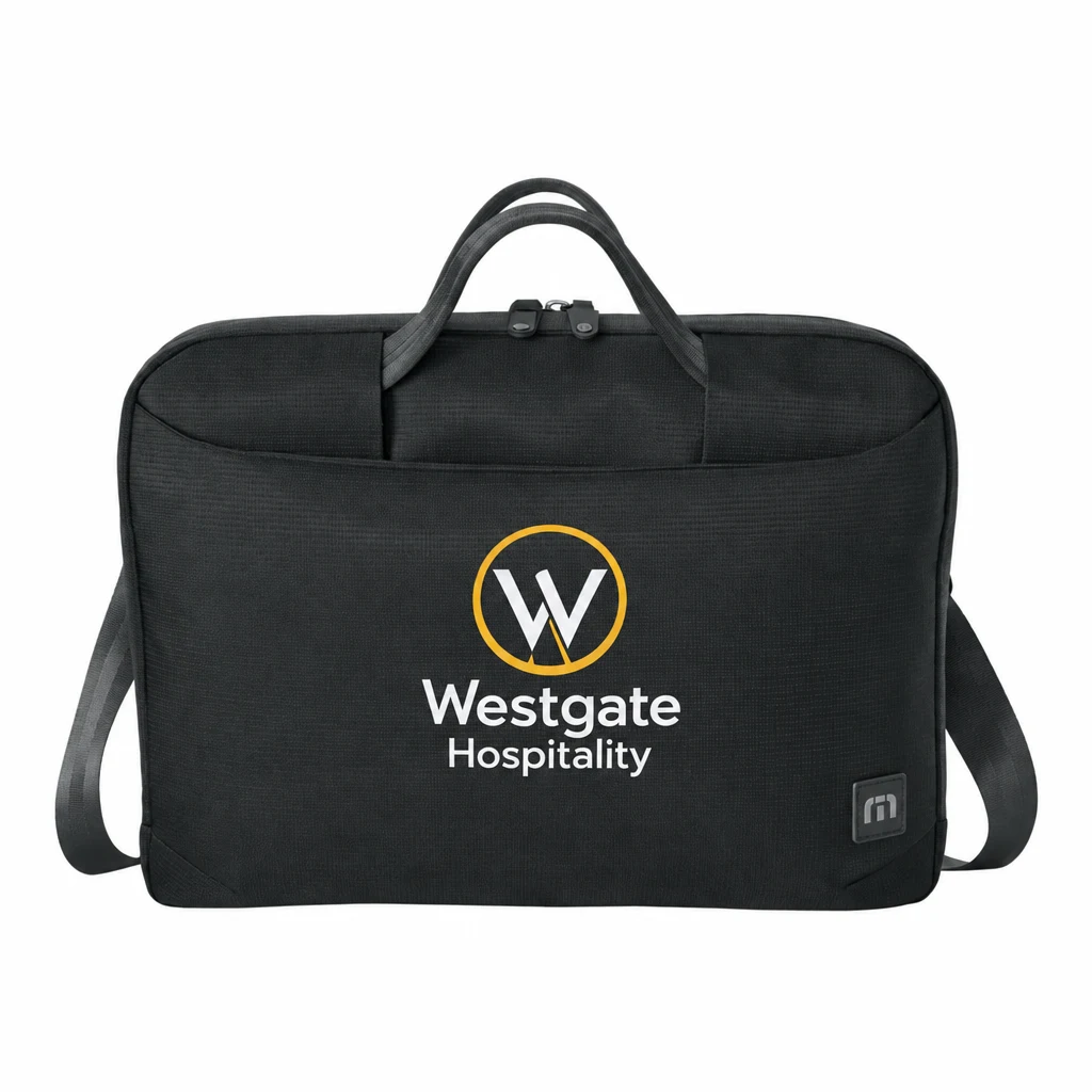 Custom TravisMathew Lateral Brief (TMB500) in Black, flat-lay view with a custom printed logo.