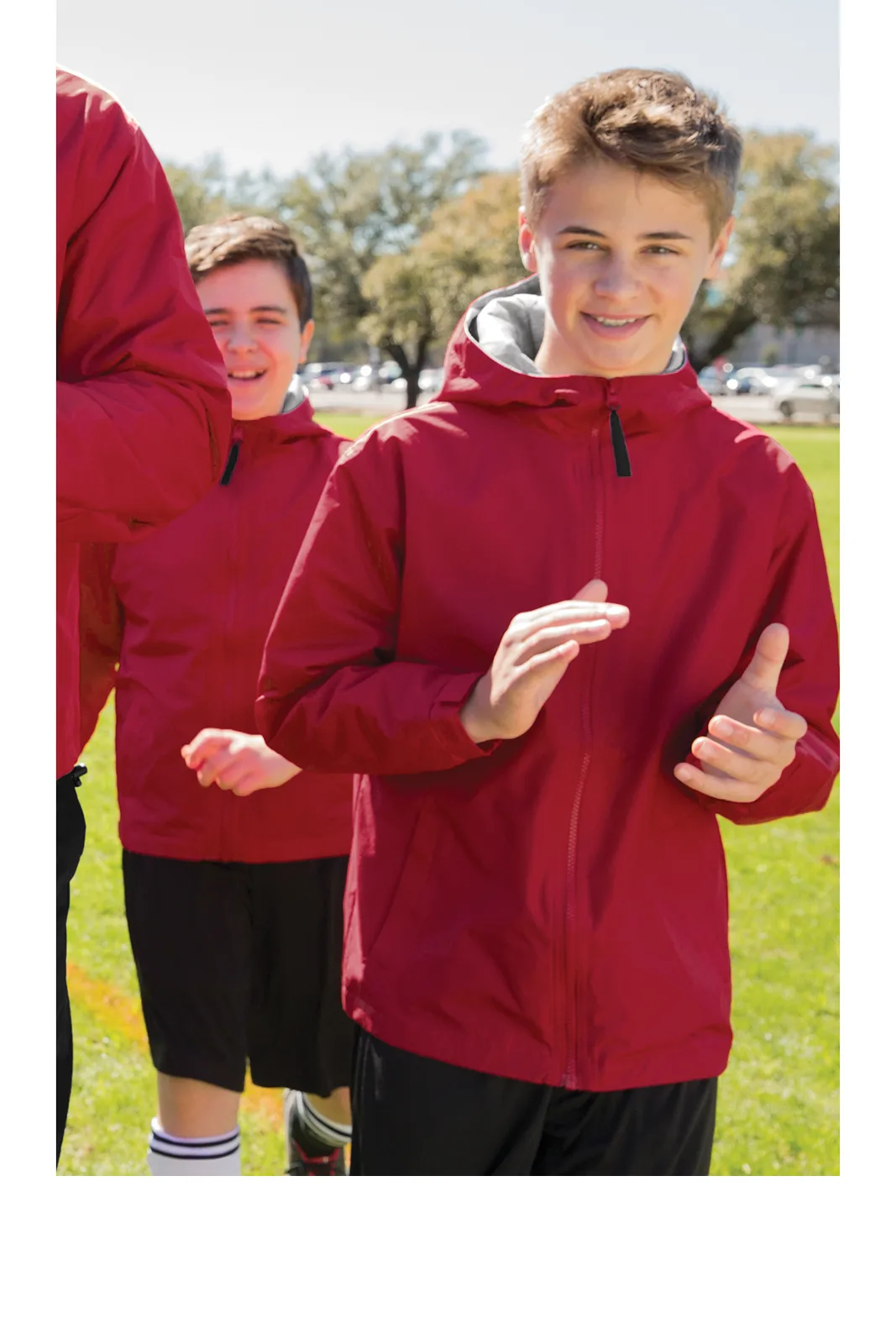 Port Authority Youth Team Jacket — Style YJP56 in Bright Navy — manufacturer lifestyle photo
