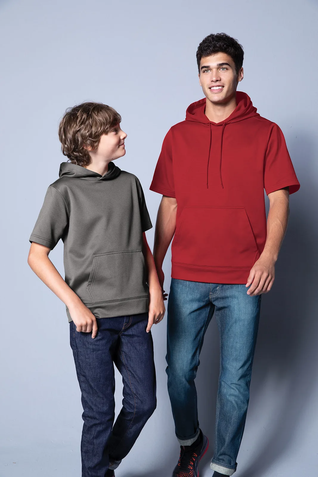 Sport-Tek Youth Sport-Wick Fleece Short Sleeve Hooded Pullover — Style YST251 in Deep Red — manufacturer lifestyle photo
