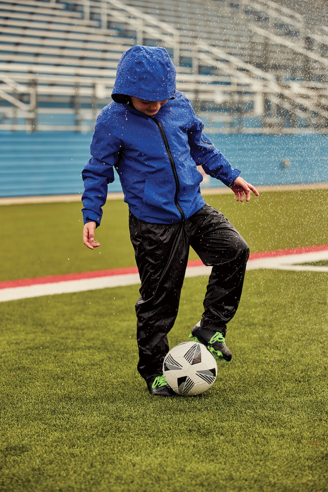 Sport-Tek Youth Waterproof Insulated Jacket — Style YST56 in True Royal — manufacturer lifestyle photo
