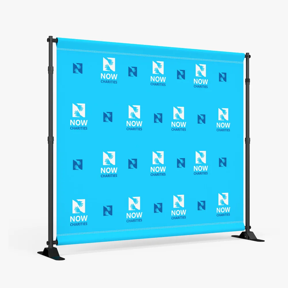 Blue step-and-repeat backdrop mounted on a portable display stand