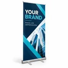 Angled view of a custom retractable banner and metal base on a white background