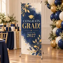 Custom graduation X-banner displayed at a celebration