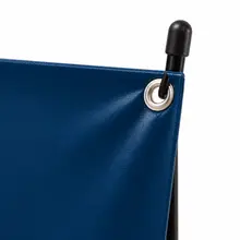 Close-up of a custom X-banner graphic corner attached to the display frame